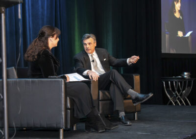 CEO Amy Schwabenlender and MC Chris Coraggio